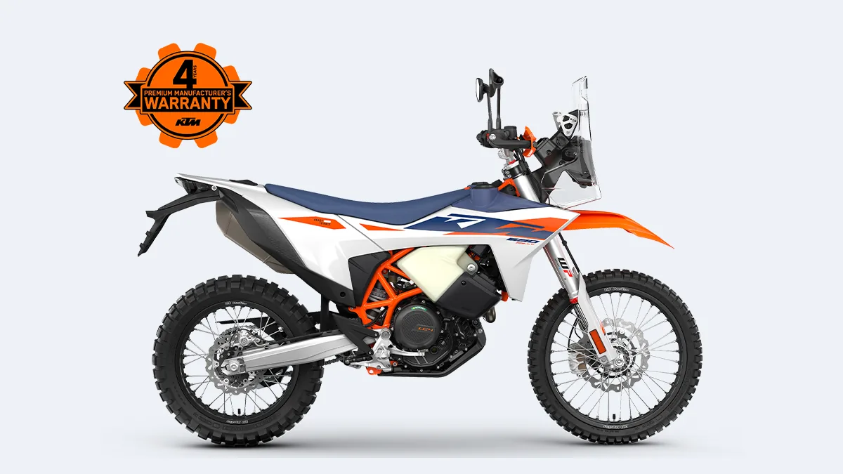 KTM 690 Rally 2027, vue de profil, blanche, bleue et orange